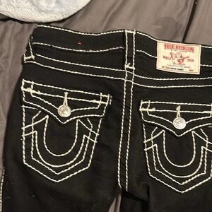 True religion black new nwot, white stitching, size 23. Tapered leg.
